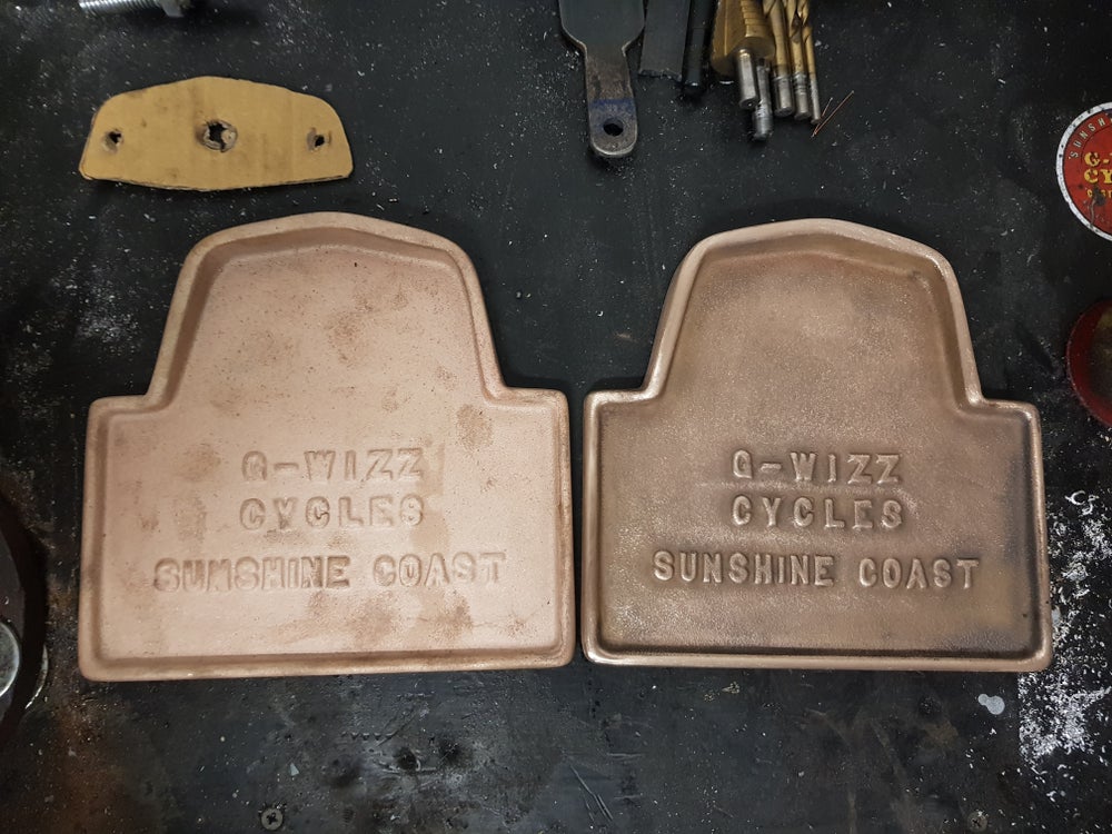 G-Wizz Cycles cast brass taillight holder showing the stages of patina finish