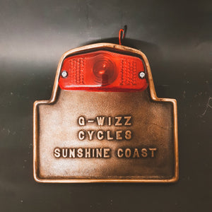 G-Wizz Cycles Cast Brass taillight licence holder with a standard Lucas taillight fitted