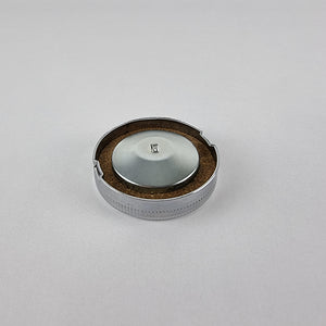 Underneath view of 2.5" Chrome British style Motorcycle Fuel Cap showing the hand cut cork gasket