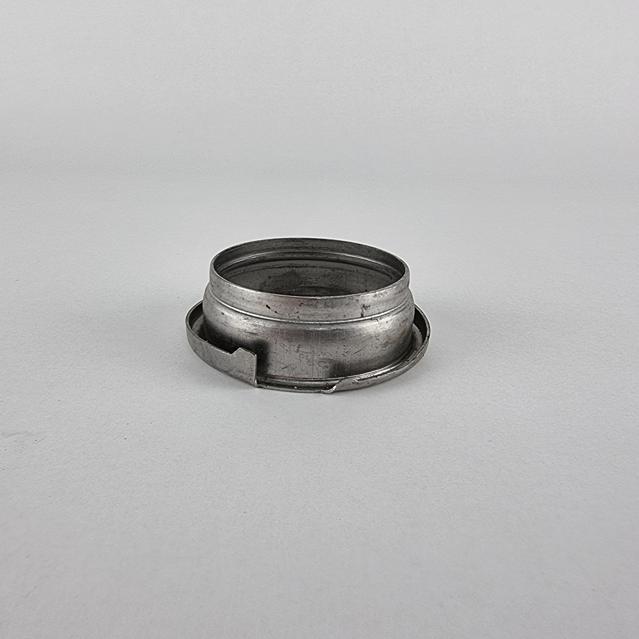 Underneath side view of steel 2.5" weld in fabrication fuel tank or oil filler